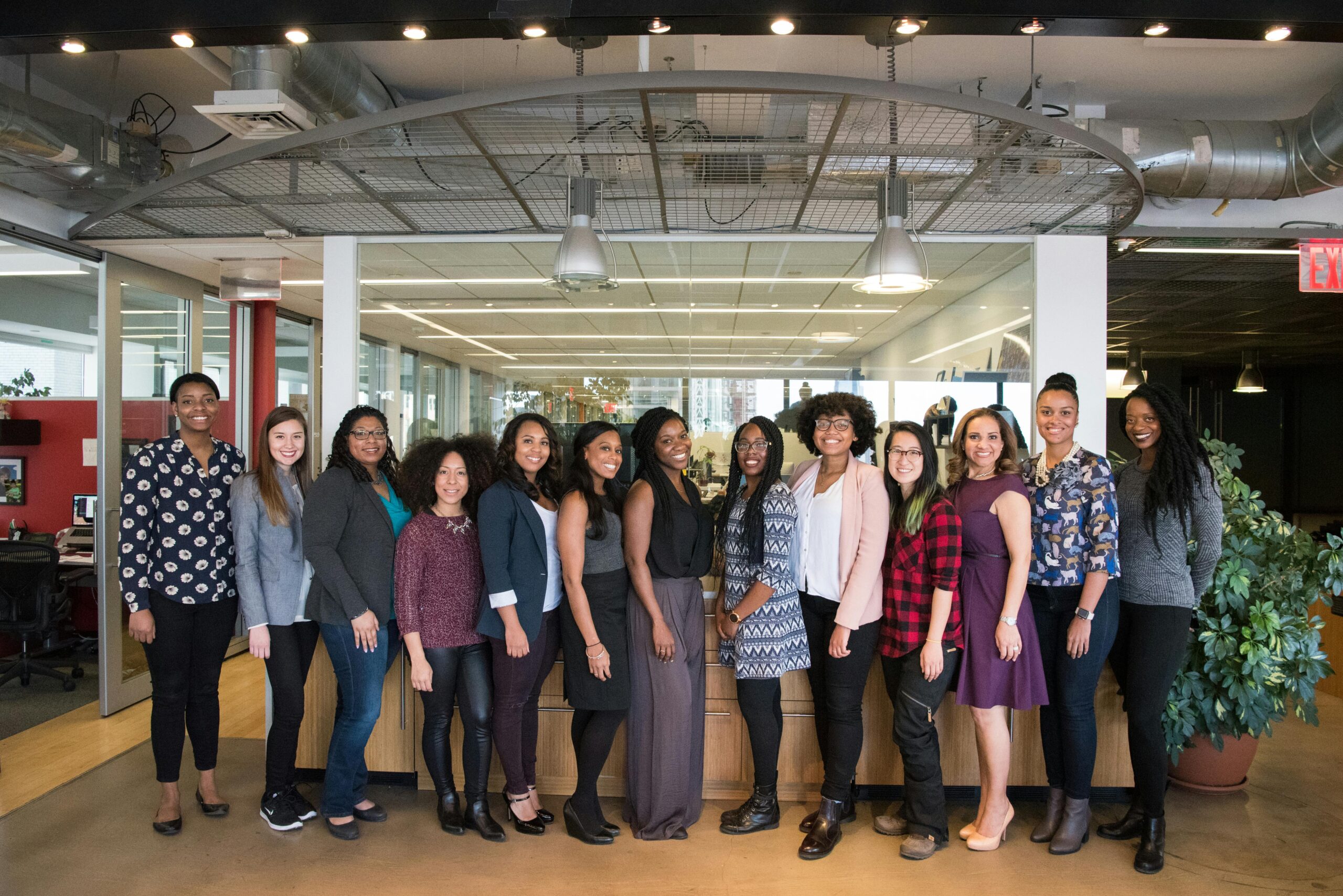 Group of women in an office setting.